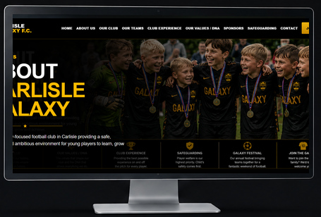 Carlisle Galaxy website displayed on a premium desktop monitor